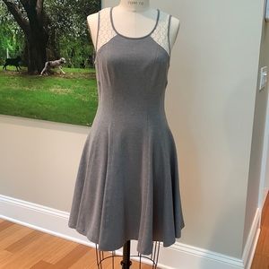 Adorable grey jersey dress with lace detail on shoulders